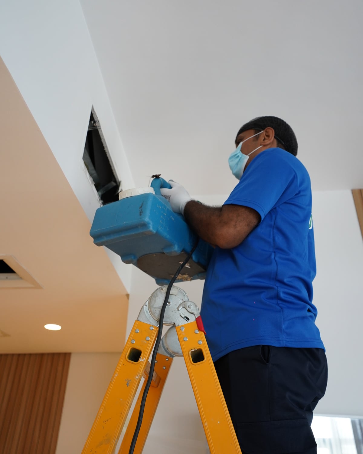 AC duct cleaning technician